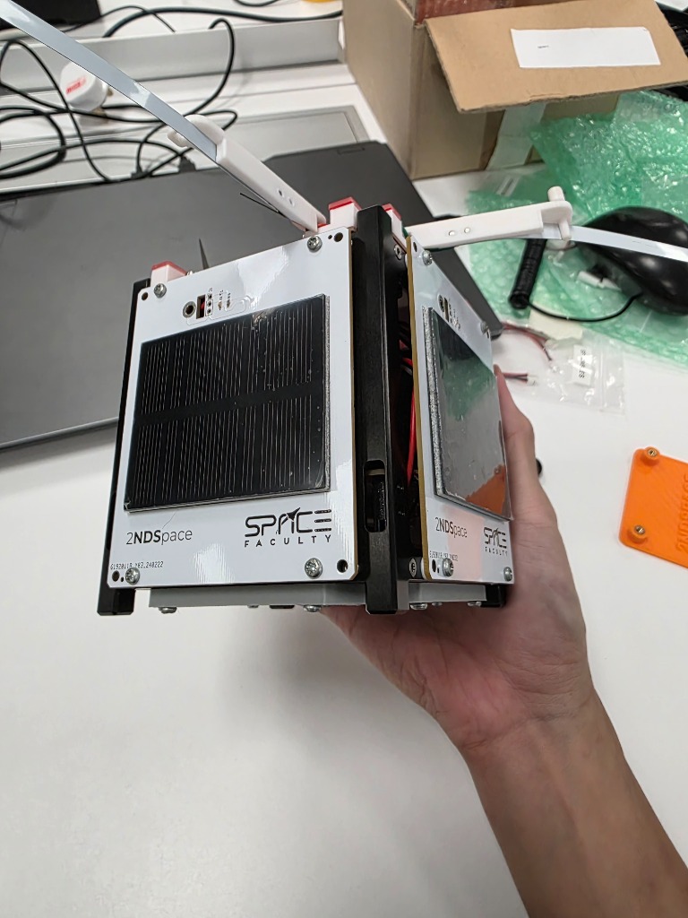 CubeSat exterior showing solar panels